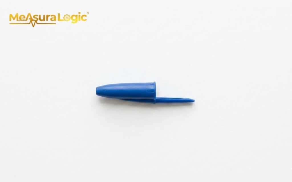 A blue plastic 1 gram pen cap isolated on a white background.
